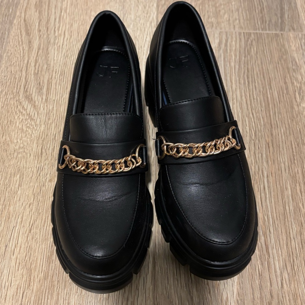 Black Leather Loafers with Gold Chain Accent